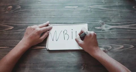 Top view, close-up hands of a man writing Stock Footage 260938434