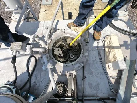 Top view close up of On-Load Tap Changer (OLTC) internal gear mechanism. Stock Photos