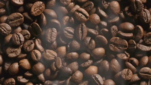 TOP VIEW: Close Up of Roasted coffee beans with a smoke Stock Footage 72406056