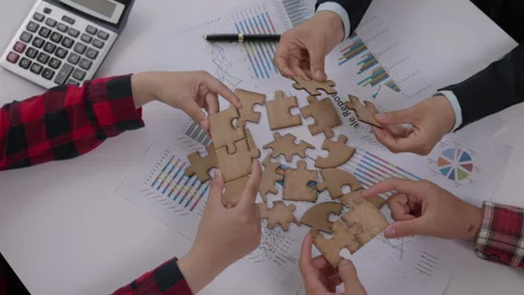 Top view close up shot of professional successful group of  Hand holding ji.. Stock Footage 336932289