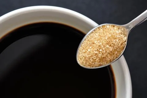 Top view, Close up of teaspoon of brown sugar, cane sugar 写真素材