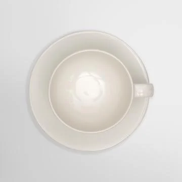 Top view-close up of a white cup on white background Stock Photos