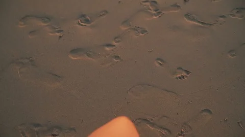 Top view close-up woman's legs in sea at sunset Stock-Footage 114071567