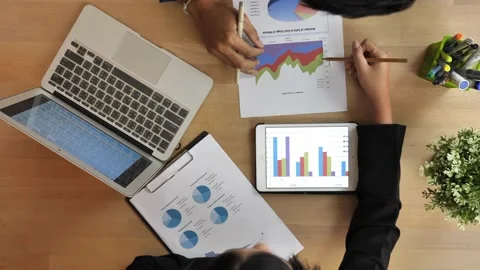 Top view Close up of young Asian businesspeople meeting about new project w.. Stock Footage 256739884