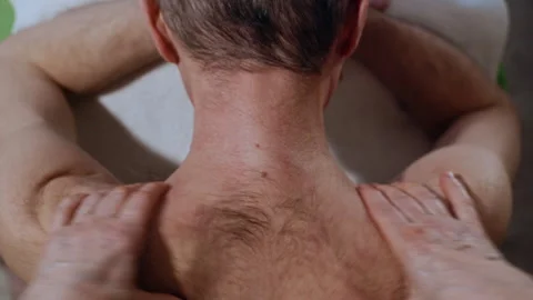 Top View Closeup of Senior Client Neck Massage by Professional Masseur Stock-Footage 311371794