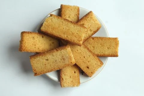 Top view closeup of stacked rectangular pieces of bread on a plate Stock Photos