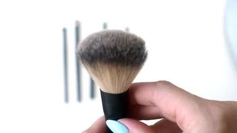 Top view closeup of various professional female cosmetics brushes for makeup . Stock Footage 111588008