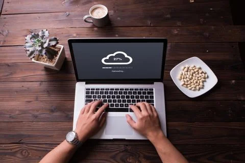 Top view of Cloud upload processing data on laptop with internet Stock Photos