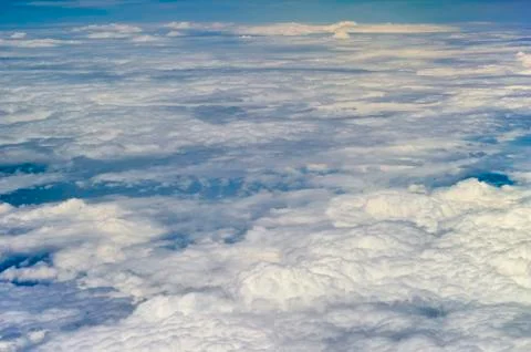 The top view on clouds from an airplane window Stock Photos