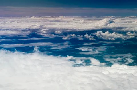 The top view on clouds from an airplane window Stock Photos