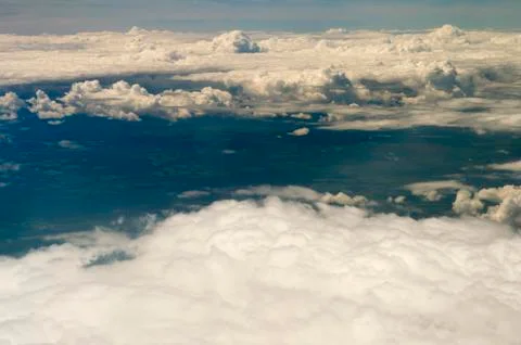 The top view on clouds from an airplane window Stock Photos