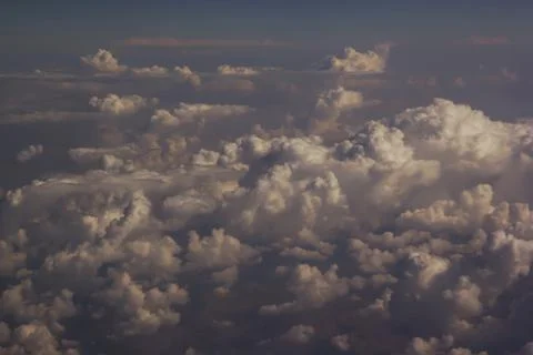 Top view of clouds from an airplane window on a sunny day Fotos Stock