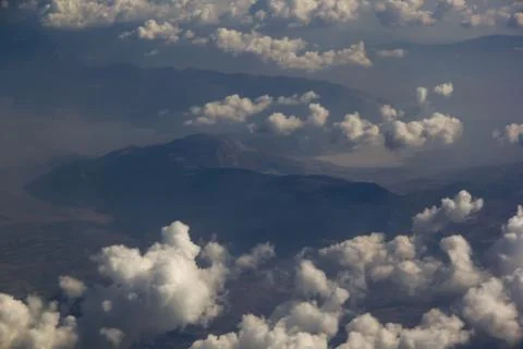 Top view of clouds from an airplane window on a sunny day Foto stock