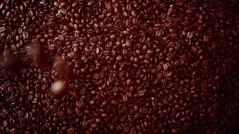 Top view of coffe beans falling from camera down to coffe beans background Stock Footage 86291534