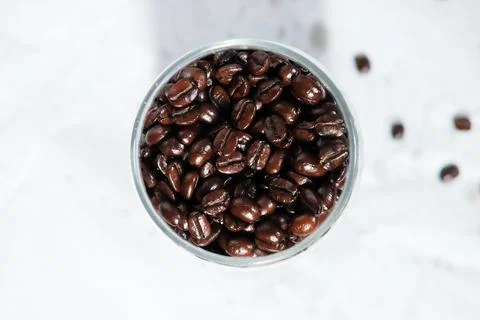 Top view of coffee beans in a cup for a blend of Arabica and robusta Stock Photos