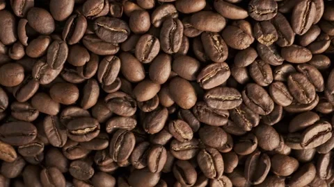 Top view coffee beans extrimaly close up circular rotation, roasted coffee flat Stock Footage 148034620