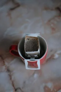 Top view coffee is brewed in a filter bag at home Stock Photos