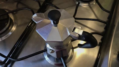 Top View of Coffee Geyser Maker Brewing on Stove 動画素材 320027254