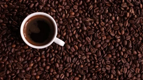 Top view coffee grains and espresso mug Stock Footage 187704276