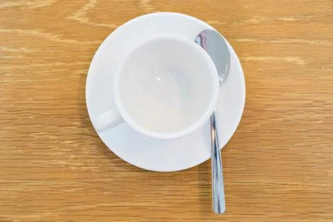Top view of coffee set with spoon and dish on table Stock-Fotos