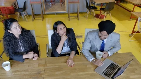 Top view of colleagues congratulate and share high five as discussing and workin Stock Footage 101936283