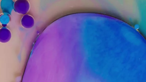 Top view of colored acrylic paint bubbles moving on milk, oil Stock Footage 252805363