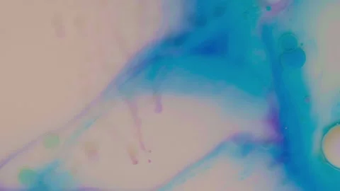 Top view of colored acrylic paint bubbles moving on milk, oil Stock Footage 252805509