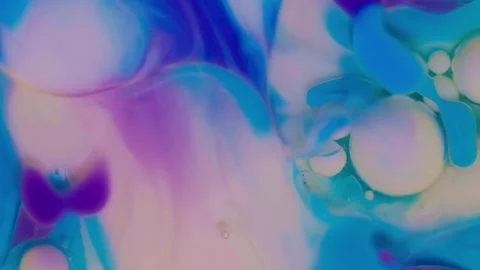 Top view of colored acrylic paint bubbles moving on milk, oil Stock Footage 252805510