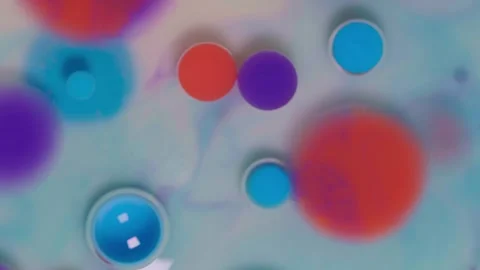 Top view of colored acrylic paint bubbles moving on milk, oil Stock Footage 252805604