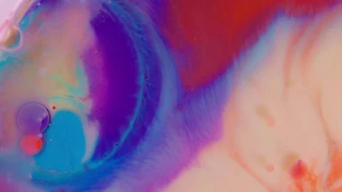 Top view of colored acrylic paint bubbles moving on milk, oil Stock Footage 252805903