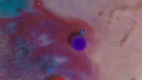 Top view of colored acrylic paint bubbles moving on milk, oil Stock Footage 252806124