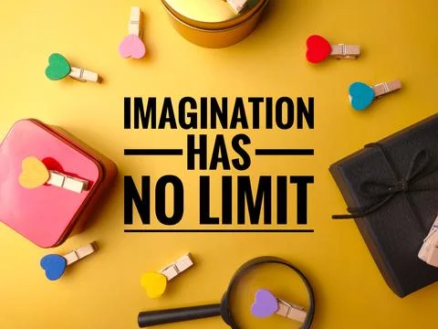 Top view colored box and colored wooden clips with text IMAGINATION HAS NO .. Stock Photos