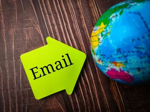 Top view colored sticky note and earth globe with text Email Stock Photos