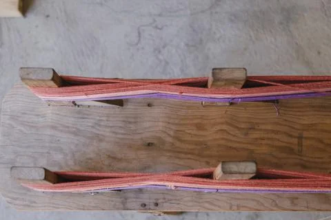 Top view of colored threads put on the loom to weave - Guatemalan fabrics Stock Photos