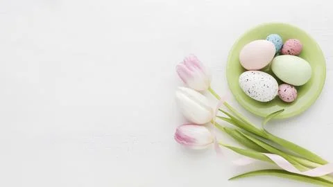 Top view colorful easter eggs plate with tulips High resolution photo Stock Photos
