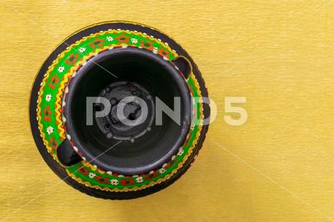 Top view of a colorful Egyptian handcrafted artistic pottery vase Stock Photos