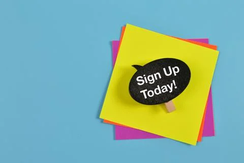 Top view of colorful paper notes and wooden tag written with SIGN UP TODAY! Stock Photos