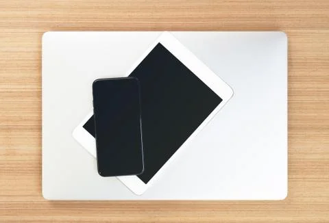 Top view of communicator electronics device on table Stock Photos