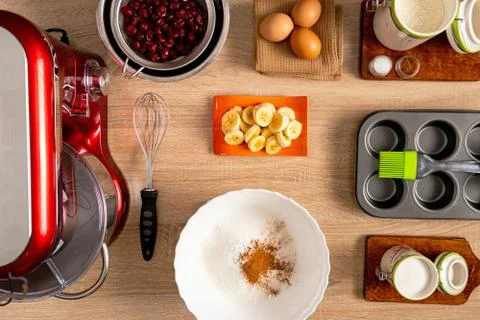 Top view of complete ingredients for making banana-cherry muffin Stock Photos