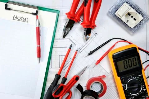 Top view of components and electrical equipment placed on the house project Stock Photos