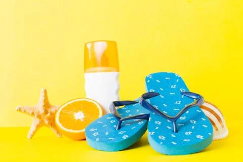 Top view composition of flip flops placed with beach accessories perspective  Stock Photos