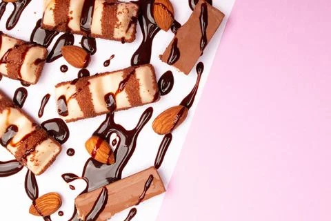 Top view composition or background with delicious chocolates and nuts Stock Photos