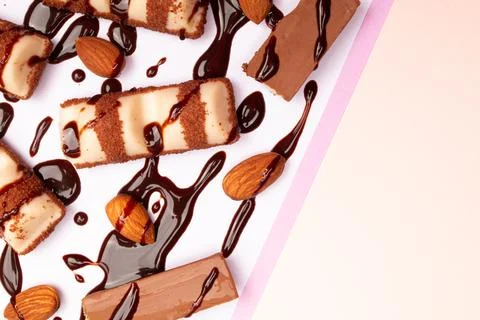 Top view composition or background with delicious chocolates and nuts Stockfoto's