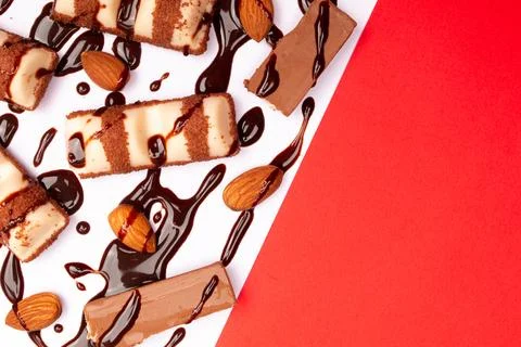 Top view composition or background with delicious chocolates and nuts Stock Photos