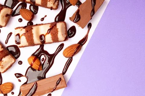 Top view composition or background with delicious chocolates and nuts Stock Photos