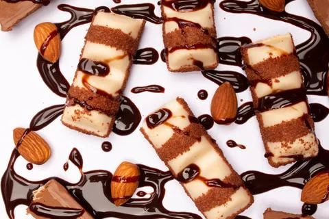 Top view composition or background with delicious chocolates and nuts Stock Photos