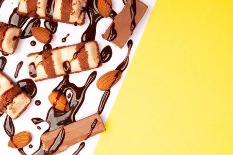 Top view composition or background with delicious chocolates and nuts Stock Photos