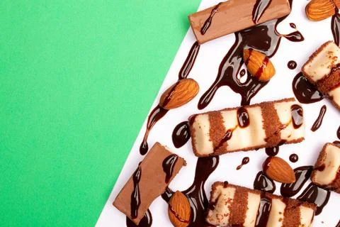 Top view composition or background with delicious chocolates and nuts Stock Photos