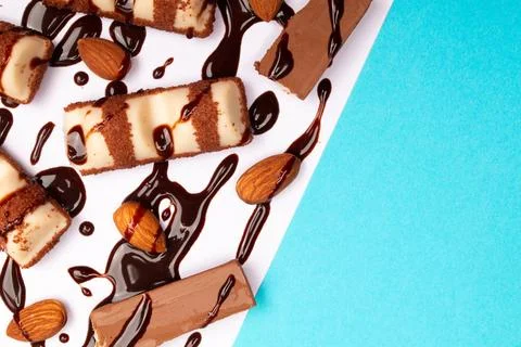 Top view composition or background with delicious chocolates and nuts Stock Photos