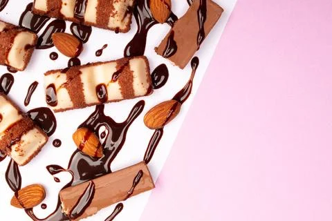 Top view composition or background with delicious chocolates and nuts Stock Photos